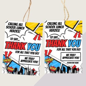 May include: Two printable thank you tags with a comic book theme. The tags feature a cityscape with red, yellow, and blue accents. The text reads "Calling all school lunch heroes! To say... Thank you for all that you do! We truly appreciate you!" One tag includes the text "From: Your Name".