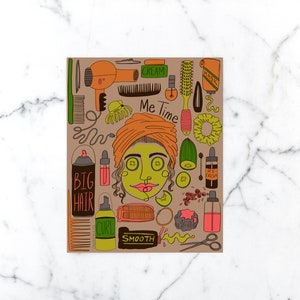 May include: A brown illustrated card with a woman's face in the center. The woman has green skin and is wearing a bright orange turban. The card is surrounded by various hair care and beauty products, including a hair dryer, combs, hair ties, and bottles of hair products. The text "Me Time" is written in black letters at the top of the card.