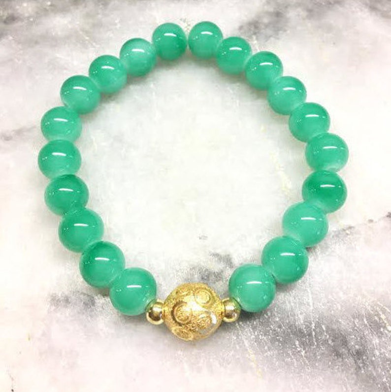 Jade Glass 8mm Beaded Bracelet With Gold Stardust Ball Accent - Etsy