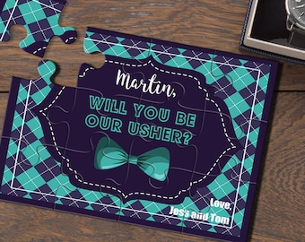 May include: A blue and green puzzle card with the text "Martin, Will you be our Usher?" and "Love, Jess and Tom".