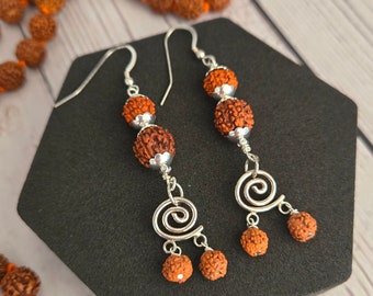 Rudraksha and silver spiral earrings for meditation and connection