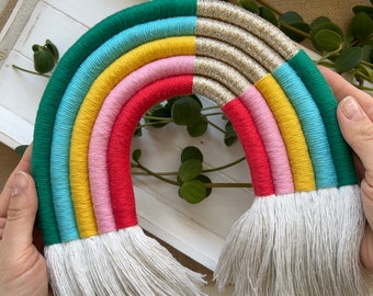 Large macrame rainbow wall hanging, green with gold insert, bedroom wall rainbow