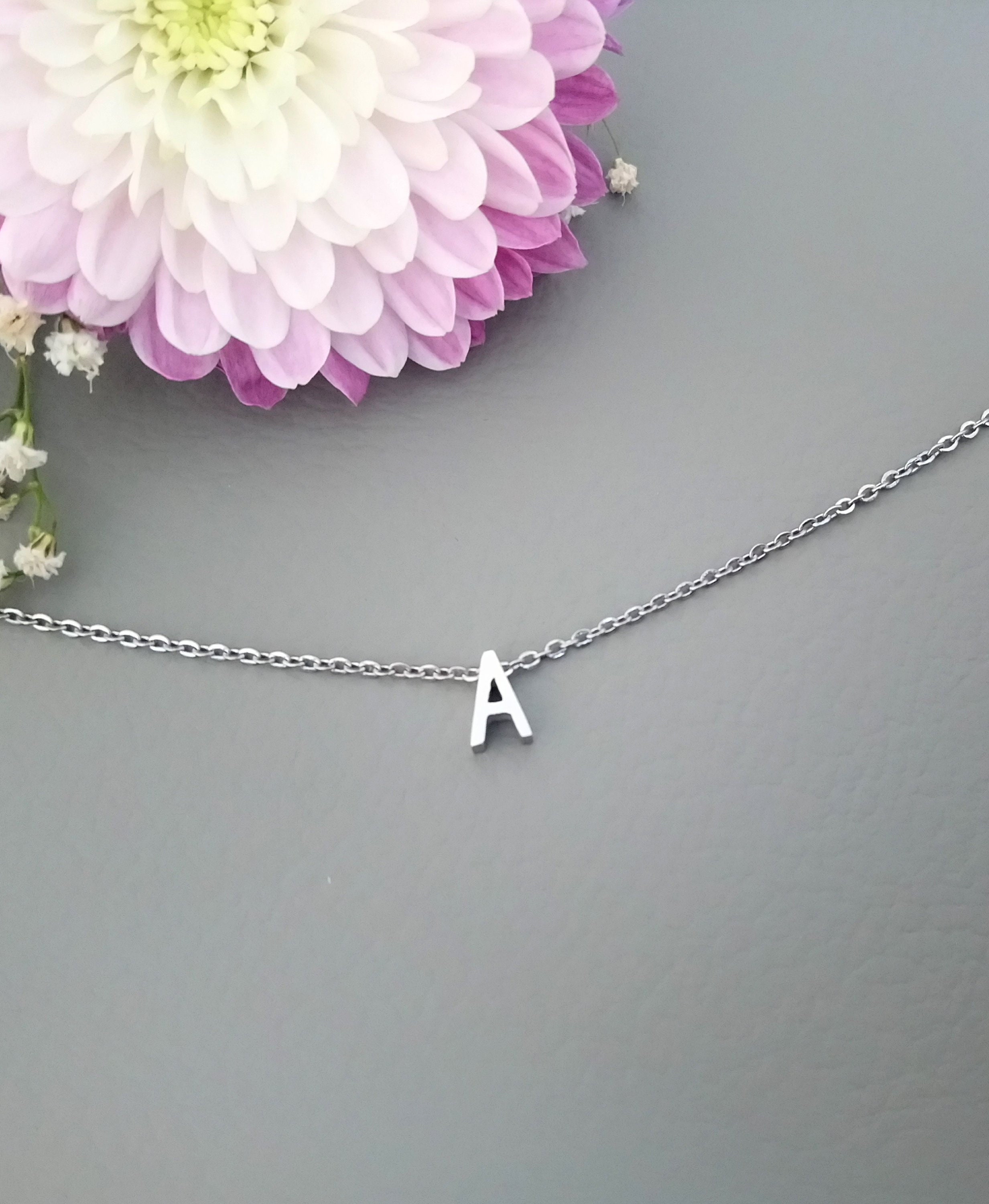 Stainless steel shop letter pendants