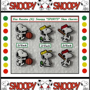 May include: Set of six Snoopy "SPORTS" shoe charms. The charms feature Snoopy in various sports poses, including basketball, golf, and baseball. Each charm is white with black accents and colorful sports accessories.