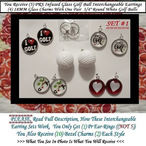 May include: Set of interchangeable golf ball earrings with a variety of designs, including golf balls, hearts, and golf-themed charms. The set includes one pair of ear-rings and ten bezel charms.  The text "SET #1" is visible in the image.