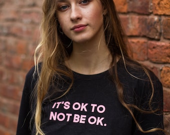 Black Slogan Mental health t-shirt, pink font, statement, depression, anxiety, black t-shirt, its ok to not be ok, pink font, statement