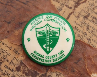 Botón pinback vintage del Distrito de Conservación de Suelos del Condado de Arenac, Michigan