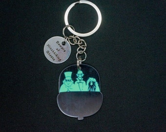 Beware of Hitchhiking Ghosts Doombuggy Haunted Mansion Inspired Custom Keychain  (iheartpinbags.com)