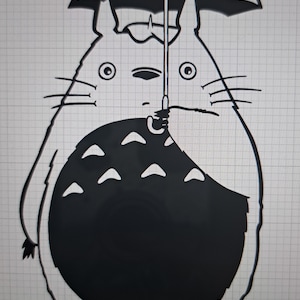May include: A black and white illustration of Totoro, a character from the animated film My Neighbor Totoro, holding an umbrella. The image features a large, round body with a detailed face and whiskers, and is set against a grid background.