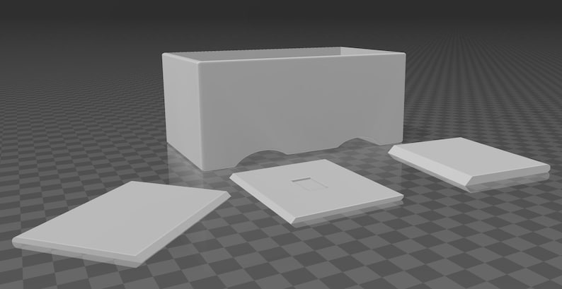 May include: A light gray rectangular box with a curved bottom edge, accompanied by three matching rectangular lids. One lid has a square cutout. The objects are arranged on a checkered surface.