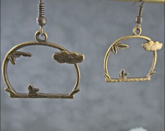 Idyll - Heaven and earth united - Small bronze earrings with brass pendant