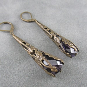 Des boucles d'oreilles remarquables, comme si elles venaient d'une autre époque. image 7