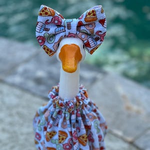 May include: A set of three ceramic mugs with a speckled, matte finish. The mugs are in shades of cream, light gray, and dark gray. Each mug has a simple, minimalist design and a rounded handle.