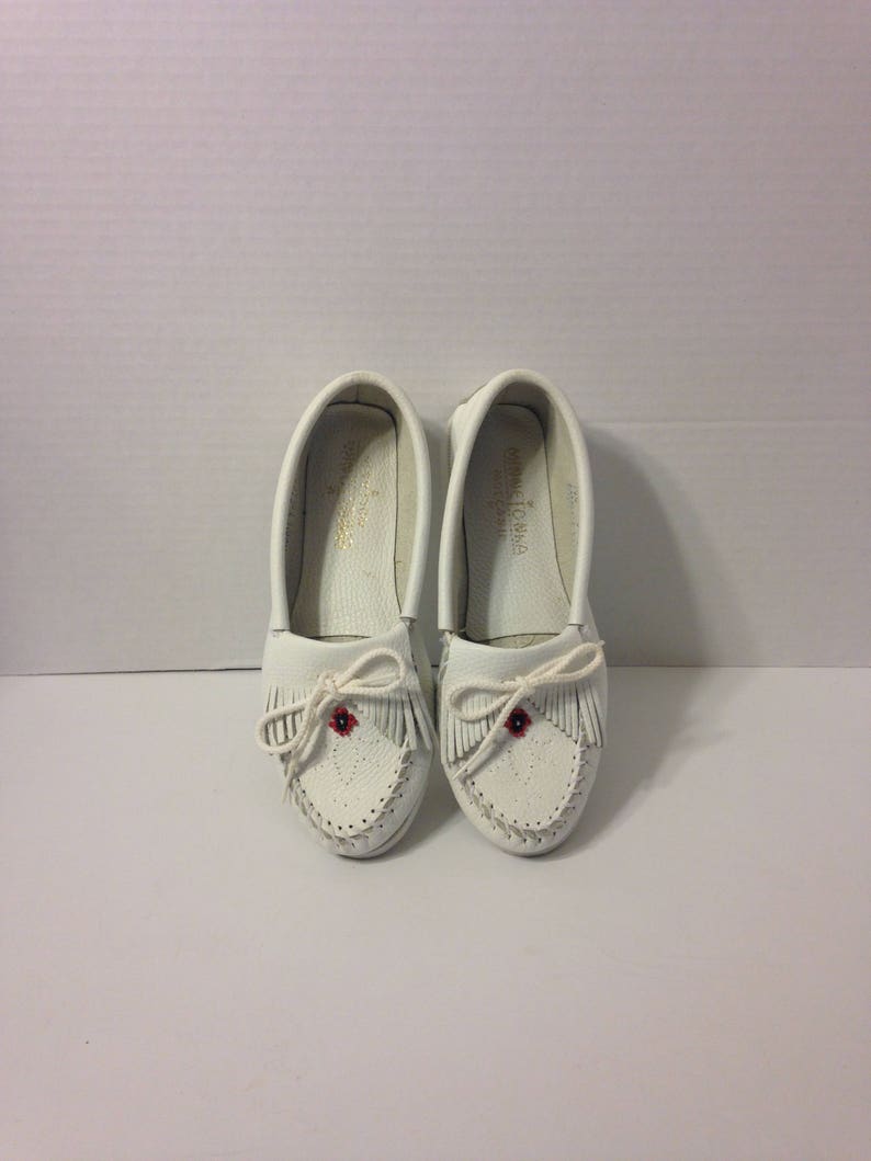 silver minnetonka moccasins
