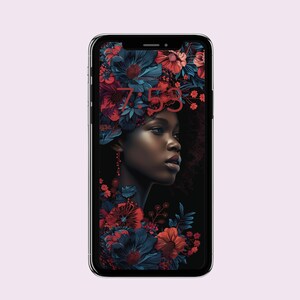 May include: A smartphone displays a digital art image of a woman with a floral headdress. The artwork features a dark-skinned woman with red and blue flowers. The time 7:53 is displayed on the screen. The phone has a black bezel and a light purple background.