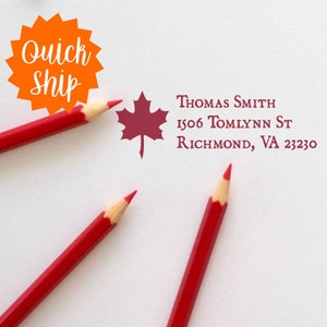 May include: A white envelope with a red maple leaf and the text "THOMAS SMITH 1506 TOMLYNN ST RICHMOND, VA 23230" printed on it. Three red pencils are on the envelope.