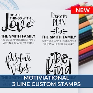 May include: A collection of four custom stamps with motivational phrases in black ink. The phrases include "Do All Things With Love," "Dream Plan Do," "Positive Vibes," and "Be Kind." The stamps also include a family name and address.