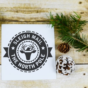 Self inking stamp featuring Sleigh Mail The North Pole design, perfect for office supplies enthusiasts. Enhance your stamp collection and explore creative stamping techniques with this festive addition.