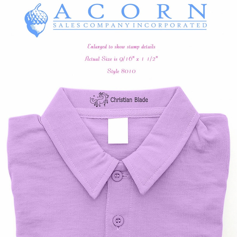 Purple shirt with a personalized self-inking name stamp for clothing, featuring an ink pad for kids stamp. The stamp displays Christian Blade in black ink, ideal for labeling garments.