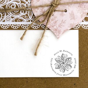 Beautifully crafted personalized stamp, perfect as a housewarming gift or gift for new home. Ideal for adding a personal touch to Christmas gifts. Features intricate design with customizable address details.