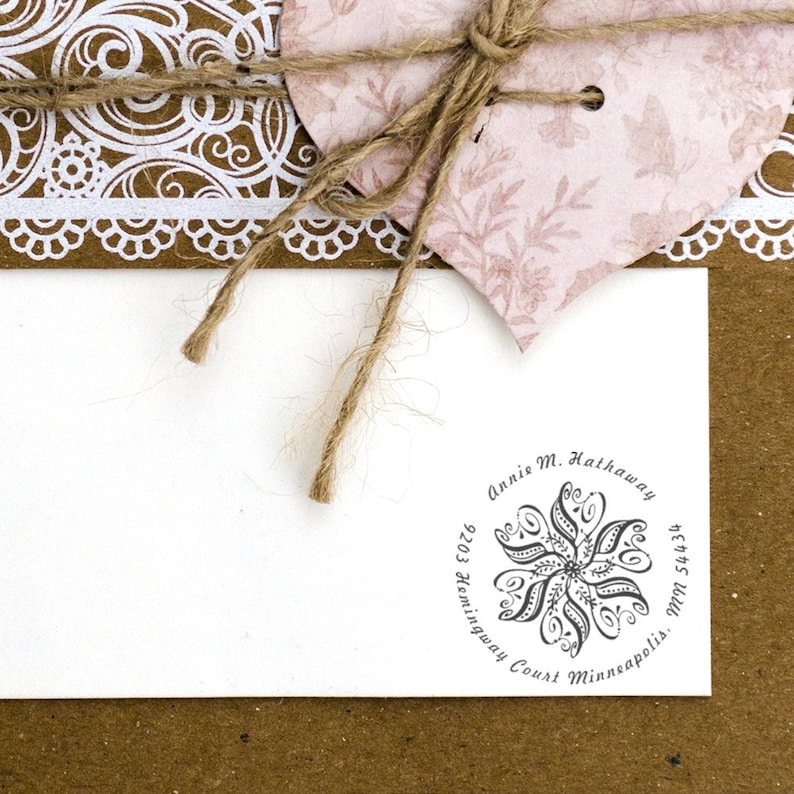Beautifully crafted personalized stamp, perfect as a housewarming gift or gift for new home. Ideal for adding a personal touch to Christmas gifts. Features intricate design with customizable address details.