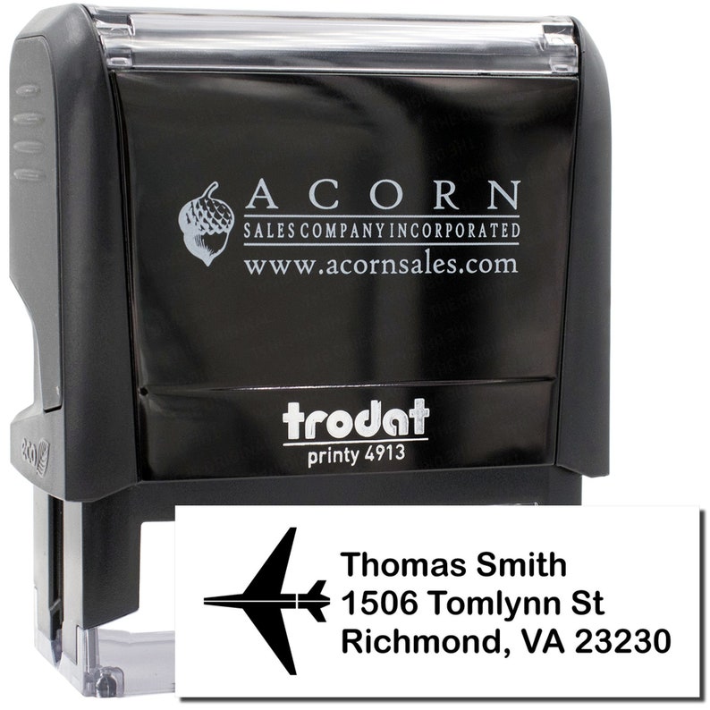 Travel-themed gift featuring a personalized address stamp with a travel stamp design. Ideal for travel enthusiasts, this custom stamp adds a unique touch to correspondence. Perfect for those who love personalized travel accessories.