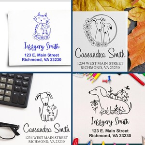 Image featuring a variety of personalized self-inking stamps, including a kittens stamp, personalized dog stamp, and bird address stamp, perfect for adding a unique touch to your correspondence and stationery needs.