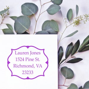 Custom address stamp featuring elegant design, perfect for new home gifts. This address stamp gift adds a personal touch to correspondence, ideal for housewarming celebrations. Personalize your mail with style and sophistication.