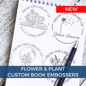 Personalized book stamp designs featuring floral motifs on a notepad. Includes self-inking library stamp and library label stamp options. Ideal for craft stamp enthusiasts seeking custom book embossers for personal collections.