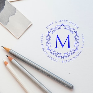 Custom address stamp featuring elegant design with personalized address label, perfect for unique gift ideas. Ideal for adding a personal touch to stationery and correspondence.