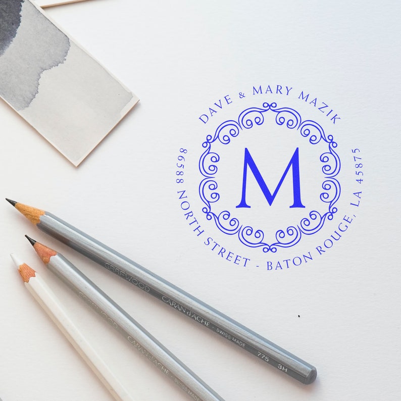 Custom address stamp featuring elegant design with personalized address label, perfect for unique gift ideas. Ideal for adding a personal touch to stationery and correspondence.