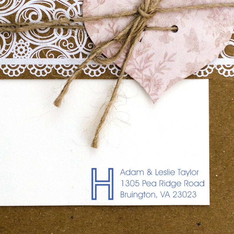Return address stamp featuring a personalized monogram stamp design on an elegant envelope. Perfect for adding a unique touch to your correspondence. Ideal for those seeking a stylish and functional personalized stamp solution.