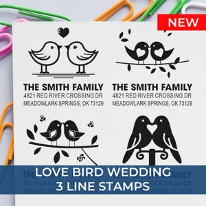 May include: A white sheet with four black love bird stamp designs. Each stamp includes the text "THE SMITH FAMILY" and address details. The stamps are labeled "LOVE BIRD WEDDING" and "3 LINE STAMPS". A red "NEW" label is in the top right corner.