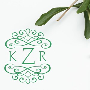 Custom stamp design featuring elegant green initials and decorative swirls, perfect for wedding favors and keepsakes. Ideal for adding a personal touch to your special day.