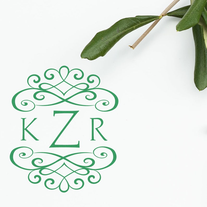 Custom stamp design featuring elegant green initials and decorative swirls, perfect for wedding favors and keepsakes. Ideal for adding a personal touch to your special day.