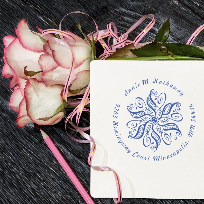 Personalized card stamp featuring a floral design, perfect for adding a unique touch to your correspondence. This flower address stamp showcases intricate details, ideal for crafting elegant invitations and letters.