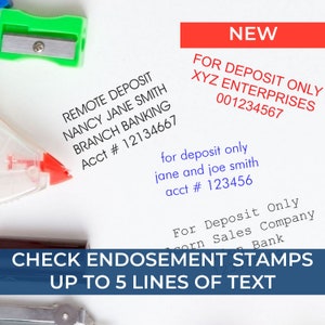 May include: A white paper with a blue and white check endorsement stamp that reads "CHECK ENDOSEMENT STAMPS UP TO 5 LINES OF TEXT". There are several red and black stamps on the paper with text that reads "REMOTE DEPOSIT NANCY JANE SMITH BRANCH BANKING Acct # 12134667", "NEW FOR DEPOSIT ONLY XYZ ENTERPRISES 001234567", "for deposit only jane and joe smith acct # 123456", "For Deposit Only Gorn Sales Company Bank".