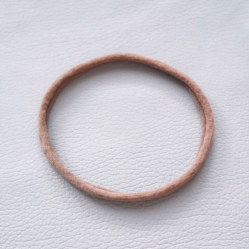 PALE MAUVE leather bow on a nylon headband \u2022 leather bow \u2022 baby bow \u2022 bow \u2022 baby headband \u2022 nylon headband \u2022 little girl