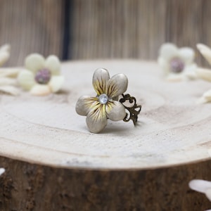 Vintage ring with white violet flower made of cold porcelain Victorian-style