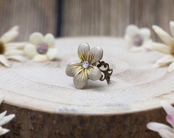 Vintage ring with white violet flower made of cold porcelain Victorian-style