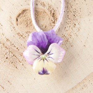 Necklace with violet pansy pendant made of cold porcelain