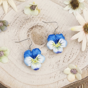 Earrings with blue cold porcelain pansies