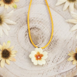 Necklace with primrose pendant made of cold porcelain