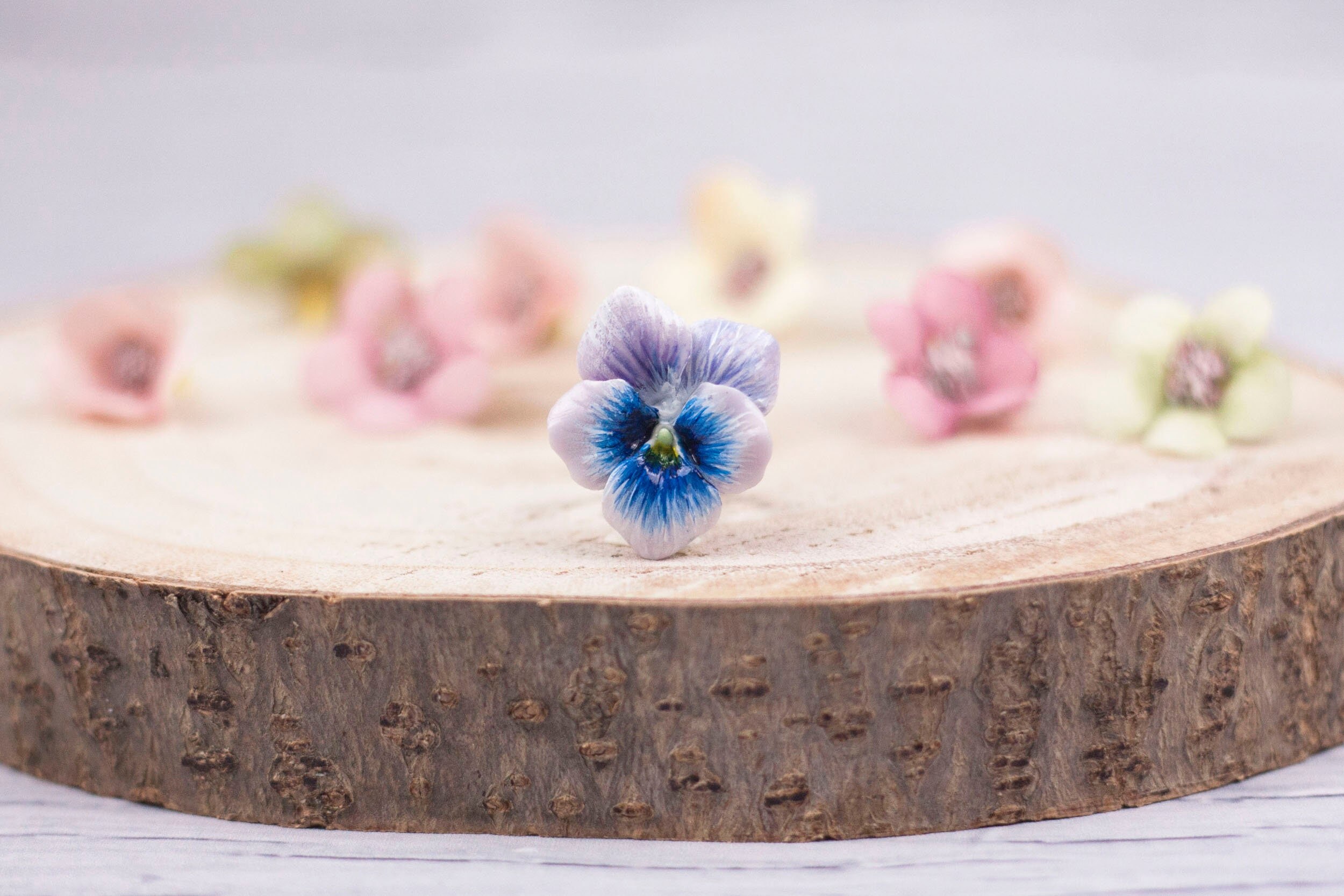 Cocktail ring with cold porcelain violet pansy