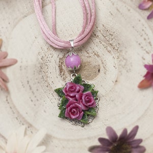 Necklace with roses pendant made of cold porcelain with jade bead