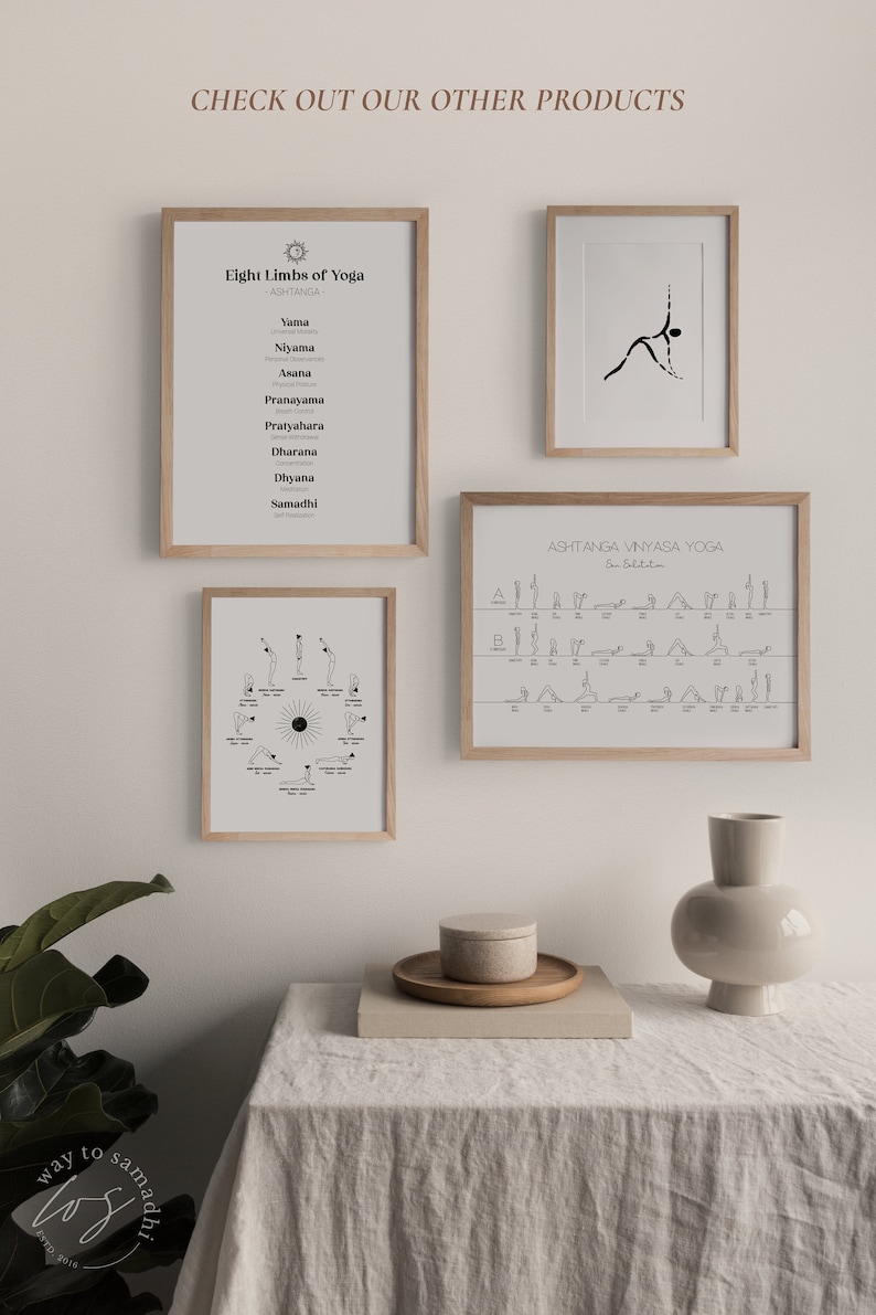 May include: Three framed prints with black and white illustrations of yoga poses. The prints are hung on a white wall. The prints are titled "Eight Limbs of Yoga", "Ashtanga Vinyasa Yoga", and "Sun Salutation".
