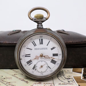 Reloj de bolsillo francés vintage REGULATEUR: movimiento mecánico Ancre, esfera de porcelana, en funcionamiento, década de 1920