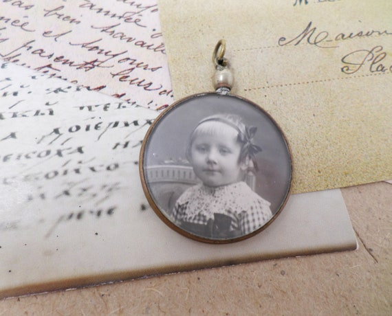 Antique Photo Frame Pendant with Portraits of Man… - image 1