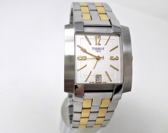 Reloj de pulsera de cuarzo suizo TISSOT para hombre con fecha, en perfecto estado de funcionamiento, totalmente de acero inoxidable, década de 1990.