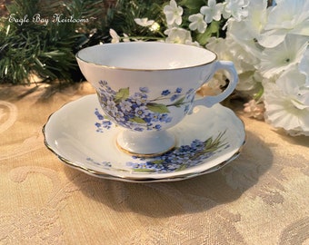 Rosina England, Footed Teacup & Saucer Set, White Bone China, Decorated with Blue Forget-Me-Nots and Gold Trim 1952